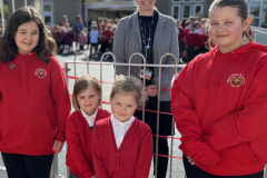 West-Row-pupils-Leah-Anderson-Ava-Davison-Ava-Palmer-and-Olivia-Meekings-cut-the-ribbon-on-the-new-play-area-alongside-Headteacher-Elisabeth-Close